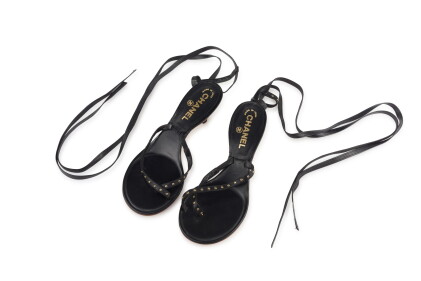 Catalog image of chanel | pair of black leather thong sandals