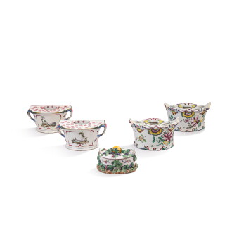 View 1 of Lot 695: A pair of French faience bouquetières, a pair of Continental faience bouquetières and a French faience butter box and cover, second half 18th century and later