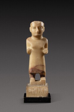 View 1 of Lot 4: A South Arabian Alabaster Figure of a Woman, Qataban, 3rd Century B.C./1st Century A.D.