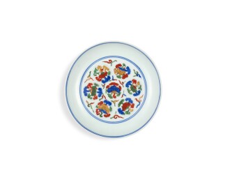 View 1 of Lot 1109: A wucai 'lingzhi' dish, Mark and period of Jiajing period | 明嘉靖	五彩靈芝八寶紋盤	　《大明嘉靖年製》款