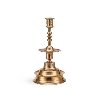 View 1 of Lot 197: Very Fine and Rare English Cast Brass 'Tudor' 'Chalice and Paten' Circular-Based Candlestick, Mid-16th Century