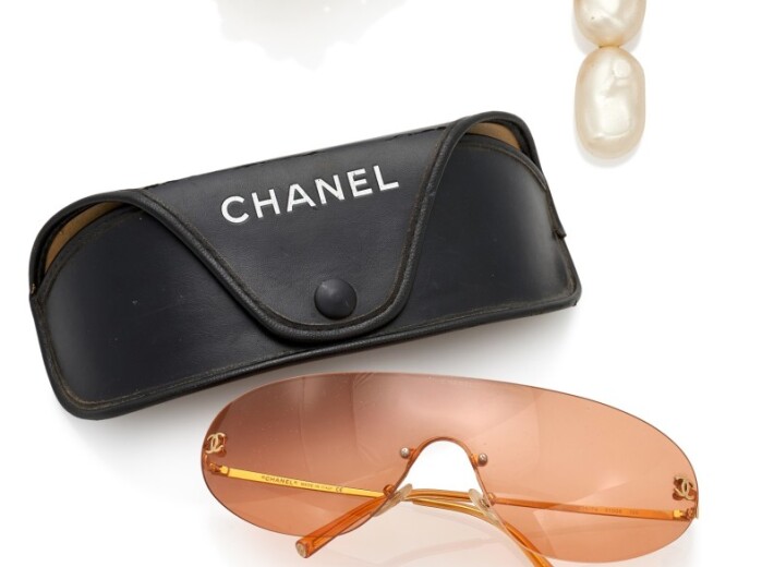 A collection of Chanel accessories sold in an auction selling luxury accessories