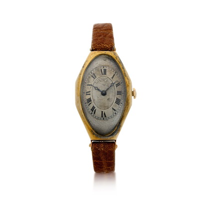 Catalog image of a yellow gold tonneau oval wristwatch, made in 1917